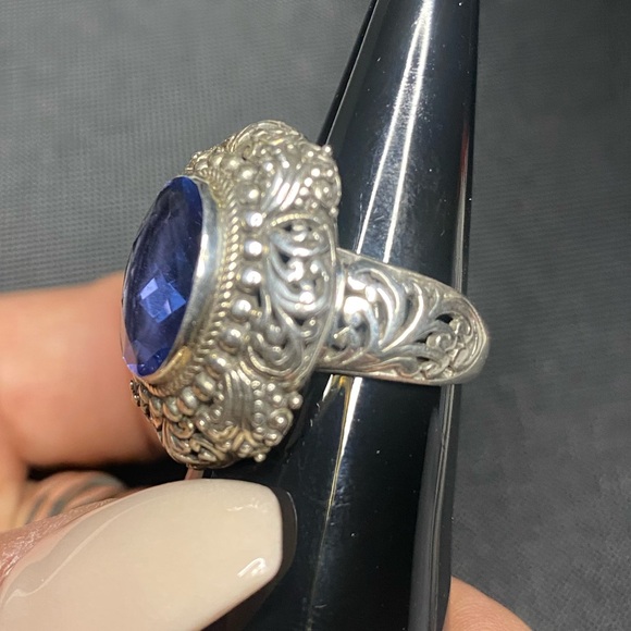 Blue Topaz and Sterling silver .925 ring. 
Size 6
Gorgeous detail. - Picture 6 of 9